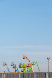 Germany, Saxony-Anhalt, Magdeburg, trading port, working platforms and telescopic forklifts. Germany, Saxony-Anhalt, Magdeburg, trading port, working platforms and telescopic forklifts.